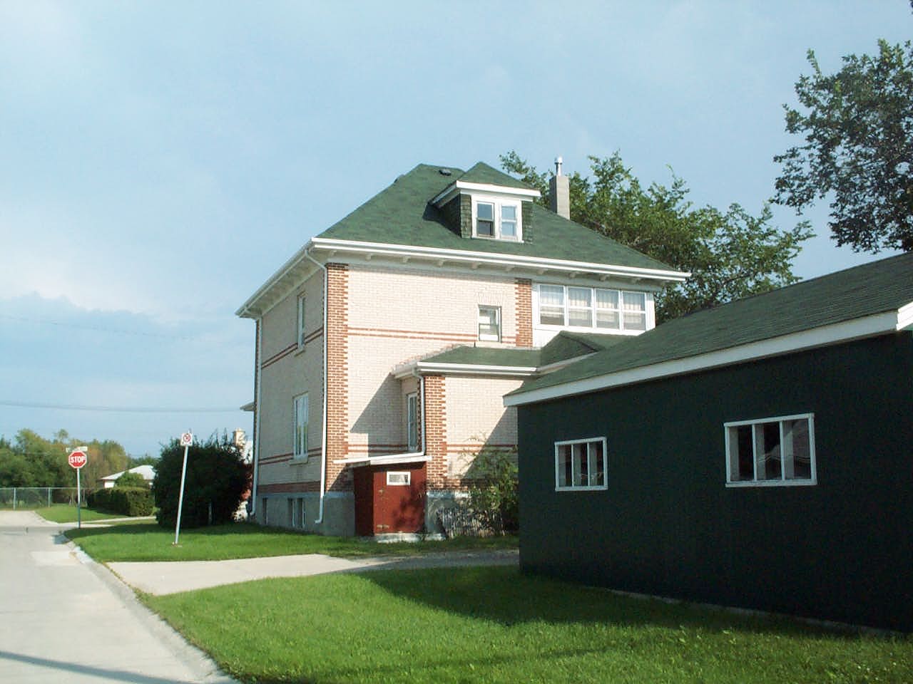 View from the North West, showing porch, attic