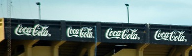 black and white Coca-Cola signs
